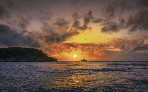 Scenic view of sea against sky during sunset