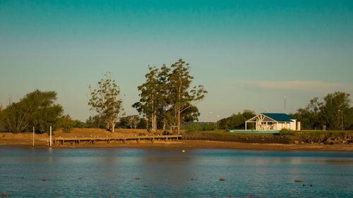 House by sea against sky