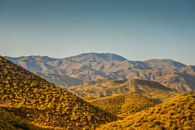 Scenic view of mountains against clear sky