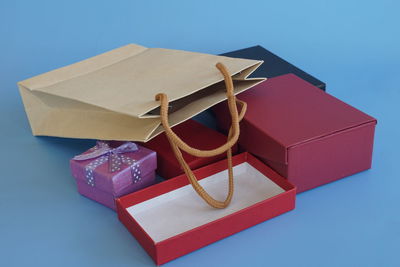 Close-up of gift box against blue background