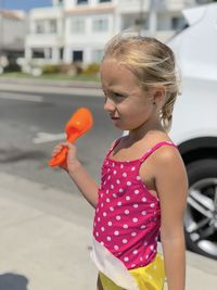 Close-up of a girl holding ice cream