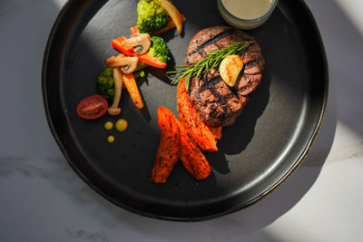 High angle view of food in plate on table