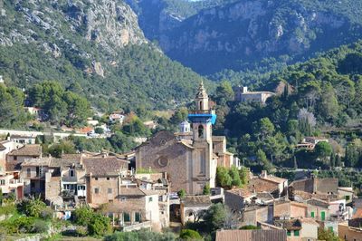 High angle view of townscape against mountain. old town deiá, spain.
