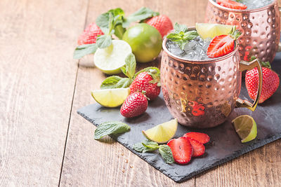 Close-up of fruits in jar on table