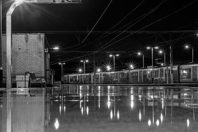 Reflection of illuminated buildings in water at night