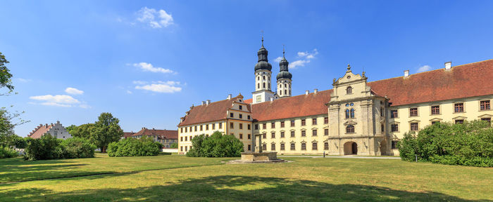 Buildings against blue sky