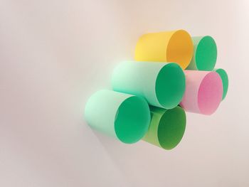 Close-up of colorful balloons on white background