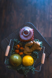 Close-up of fruits in plate on table
