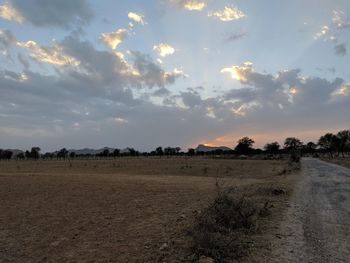 Scenic view of landscape against sky during sunset