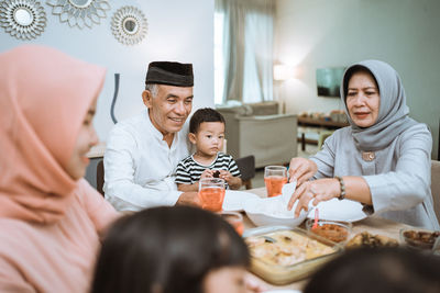 Group of people having food