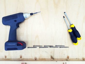 High angle view of hand tools on table