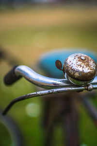 Close-up of cycle bell against blurred background