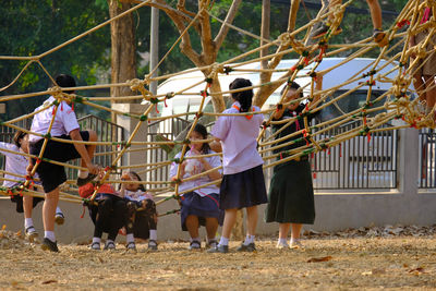 Group of people playing on field