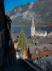 Panoramic view of road amidst buildings against sky