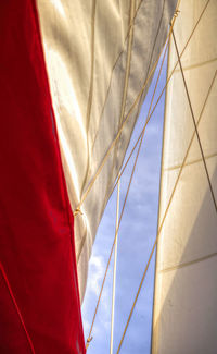 Low angle view of mast and canvas