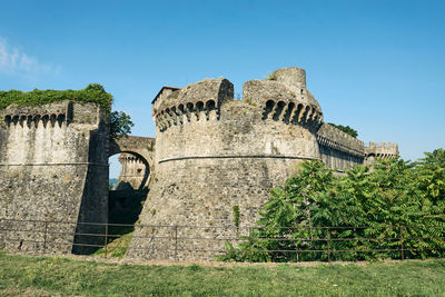 Low angle view of fort against the sky