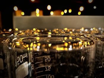 Close-up of measuring jars on table