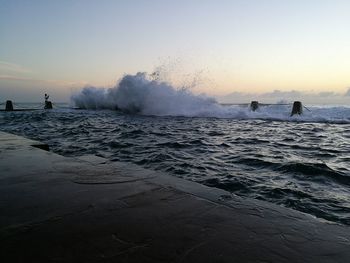 Scenic view of sea against sky at sunset