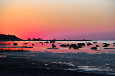 Scenic view of sea against sky during sunset