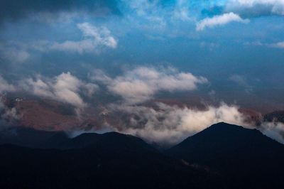 Scenic view of silhouette mountain against sky