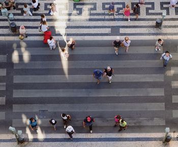 Directly above shot of people crossing street