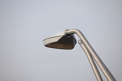 Low angle view of street light against clear sky