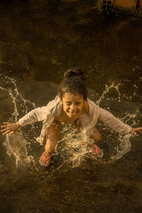 Girl playing in water