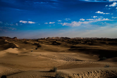 Scenic view of desert against sky