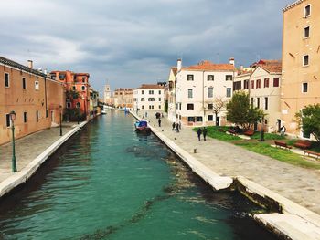 View of canal in city