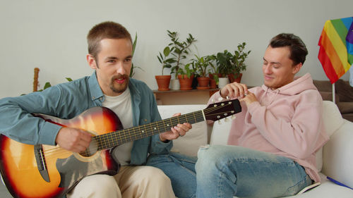 Young man playing guitar