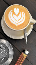 Close-up of cappuccino on table