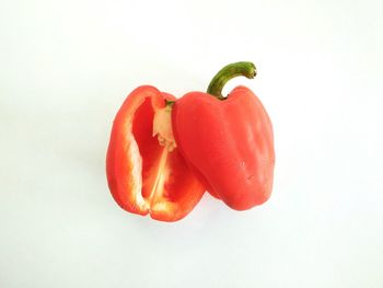 Close-up of bell peppers against white background