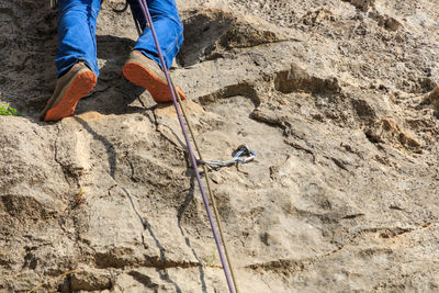 Low section of man on rock