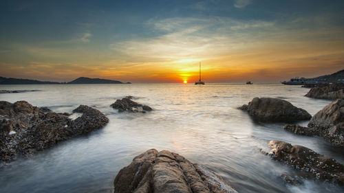 Scenic view of sea against sky during sunset