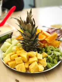 Close-up of fruits in plate on table