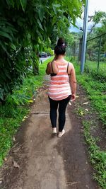 Full length of woman walking in park