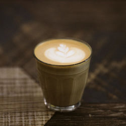 Close-up of coffee cup on table