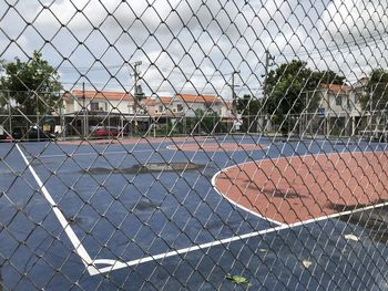 Chainlink fence against sky