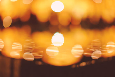 Close-up of illuminated lights at night