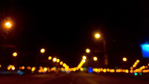 Illuminated street light at night