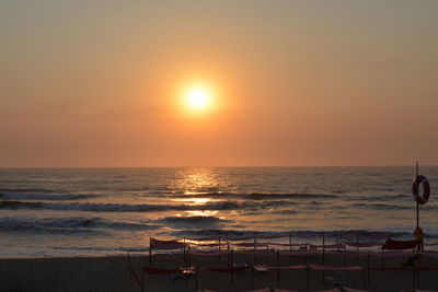 Scenic view of sea at sunset