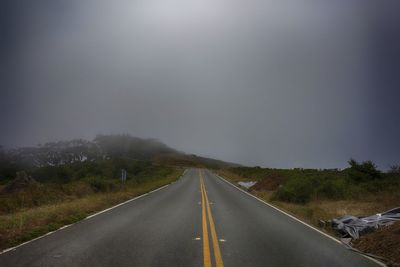 Road amidst landscape against clear sky