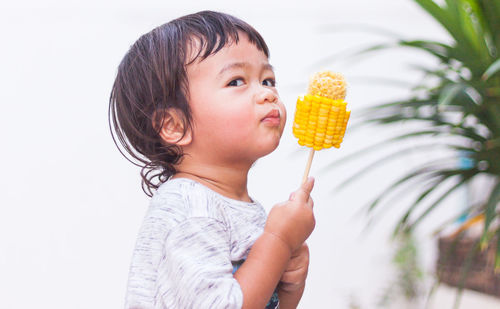 Young woman holding ice cream