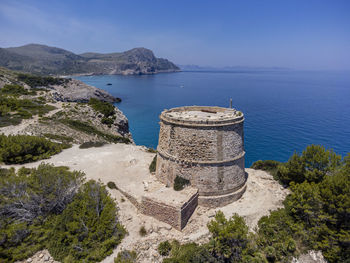 High angle view of sea shore against sky