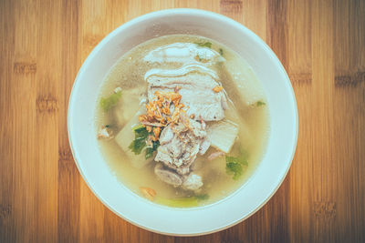 Directly above shot of soup served on table