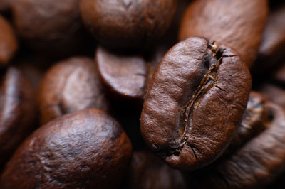 Macro shot. close up macro group of roasted brown or black coffee beans background