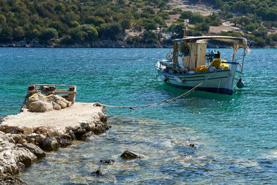 Fishing boat moored in sea