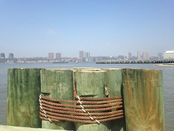 Panoramic view of sea and buildings against sky