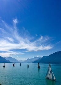 Scenic view of sea against blue sky