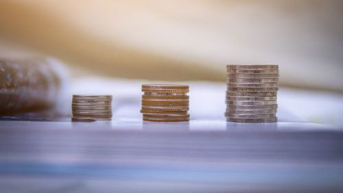 Close-up of coins on table